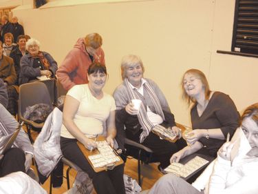 Some of the Bingo-goers wait for the draw Some of the Bingo-goers wait for the draw